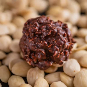 Bombón de Roca con almendre y chocolate negro Tulakalum