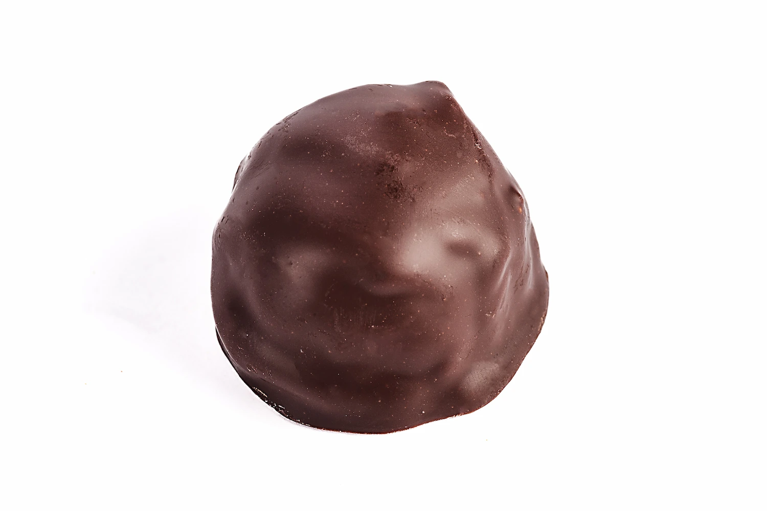 Bombon relleno de turrón con chocolate negro